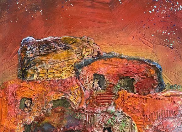 Tableau représentant une ville dans les tons de rouge