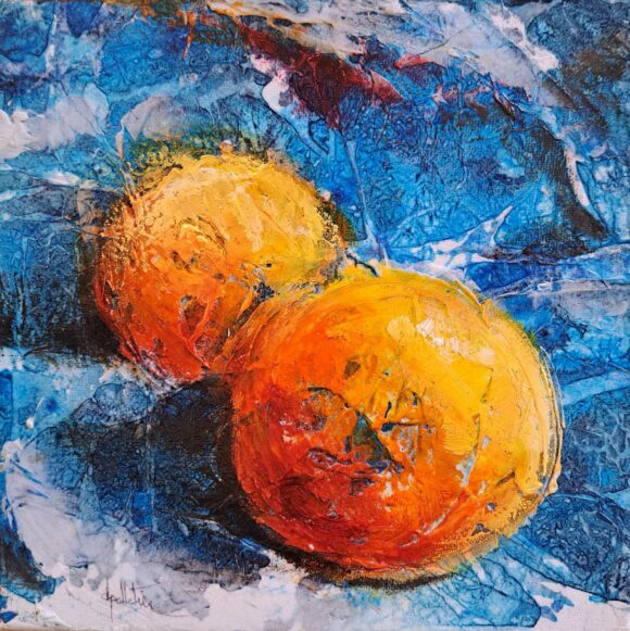 Tableau représentant deux oranges sur fond bleu